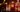 Baccarat Rouge 540 Extrait bottle on black marble with crystal glassware in warm amber light, Fragmentum